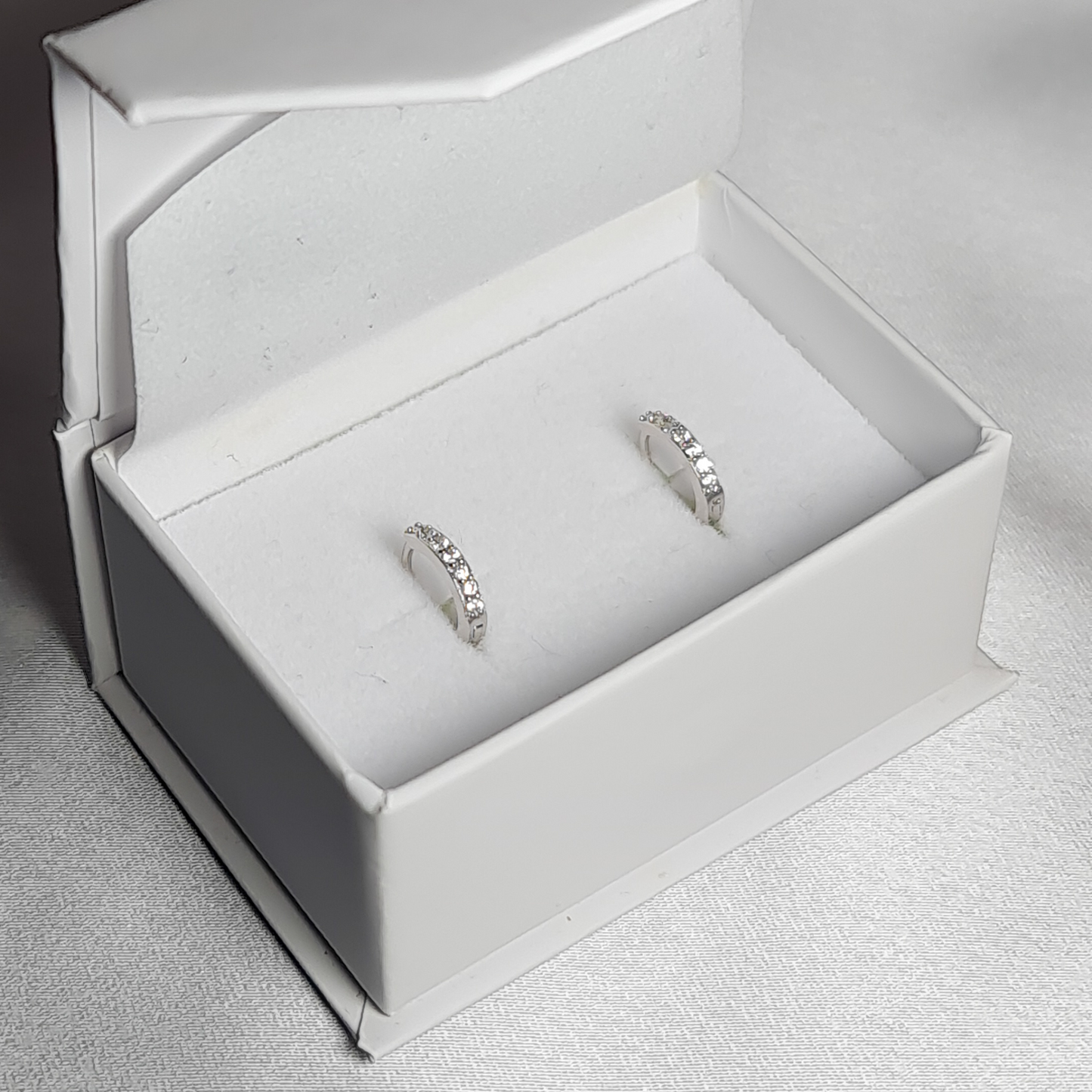 Shiny Minimalist Silver Huggies Small